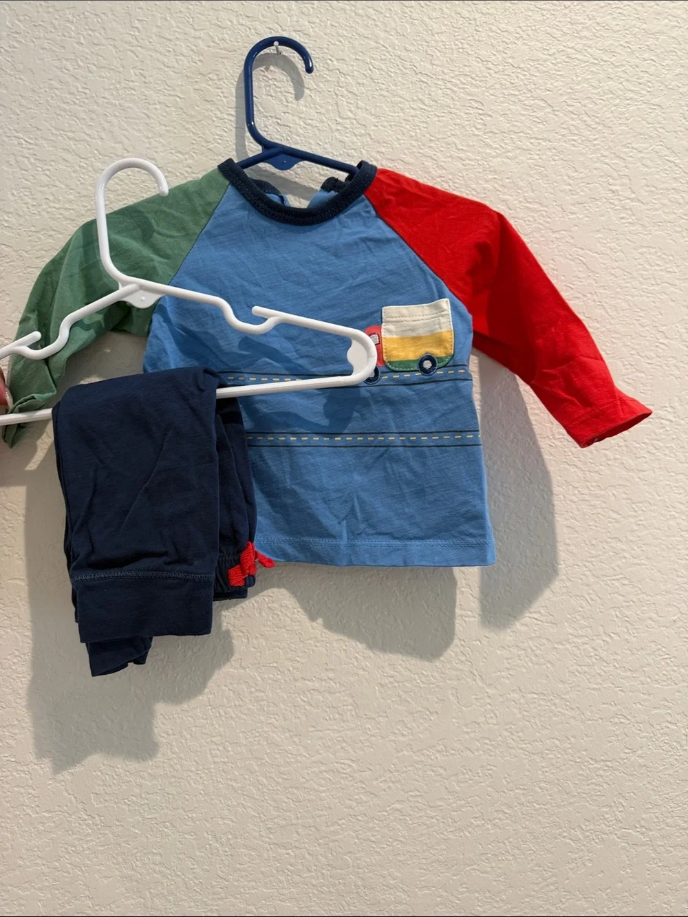 Little Me Light Blue Top with Navy Trim and Red Accent